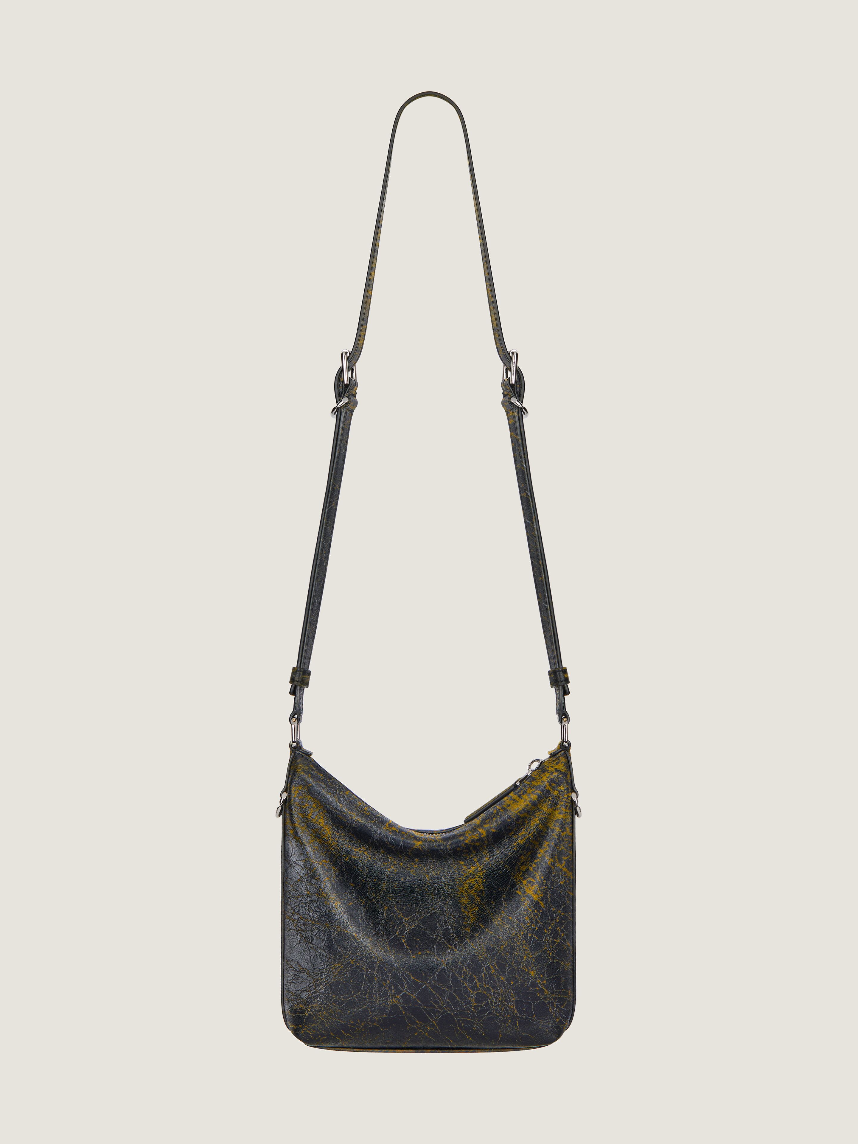 Small Voyou Crossbody bag in crackled leather